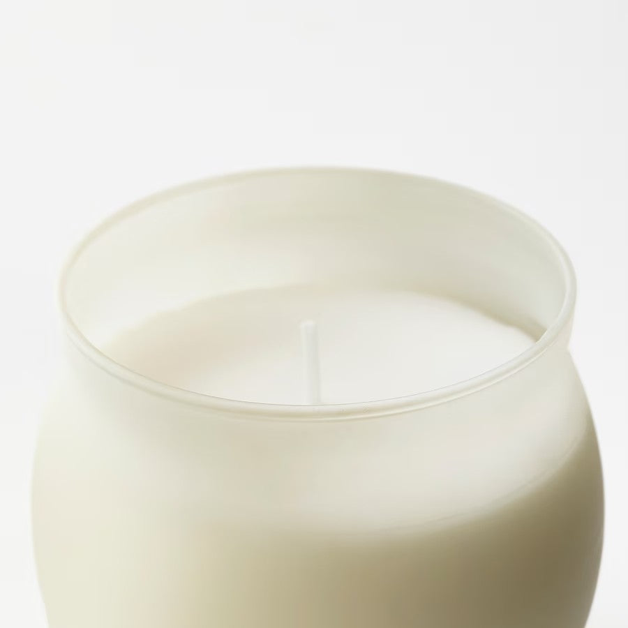 JÄMLIK Scented candle in glass, Vanilla/light beige, 50 hr